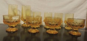 lot 129 image: Set of yellow depression glasses 2 tea 4 goblets and 4