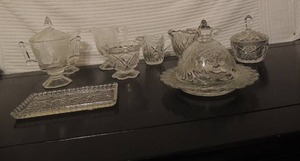 lot 215 image: Various clear glass-  candy dishes, creamer & sugar,  covered dishes