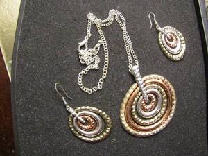 lot 365 image: Necklace and earring set silvergoldcopper