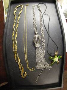 lot 358 image: Necklaces- 30 silver with balloon chains, 24 gold with black twisted , star on black cord 22 goldstone chain