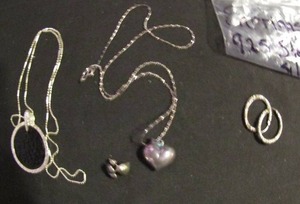 lot 339 image: .925 silver chain with heart with matching earrings ,silver hoops, silver chain with black medallion