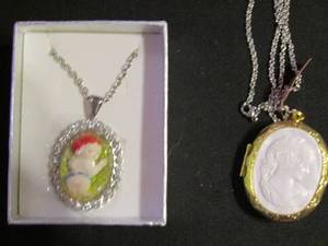 lot 335 image: Unusual angel pendant gold tone cameo locket
