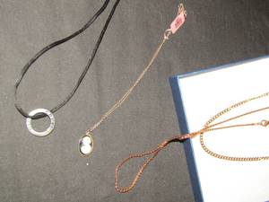 lot 337 image: 2 gold tone chains, corded necklace cruel girl cameo on chain