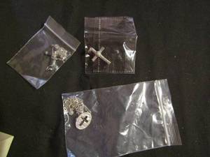 lot 389 image: Silver chain with cut cross pendant, silver chain 1.5 new, silver & black cross on thin chain NEW