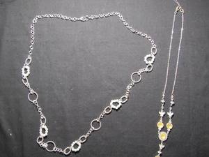 lot 381 image: Silver circle & chain with pearl accents in drop and butterflies