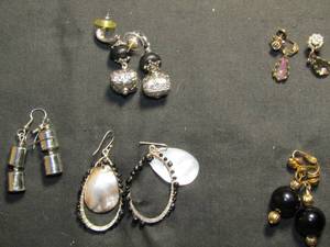 lot 374 image: Earrings- black bead & gold clip on, gold with rhinestone drop clip on, silver black ornate with square bead pierced and silver hoop with black bead and shell pierced