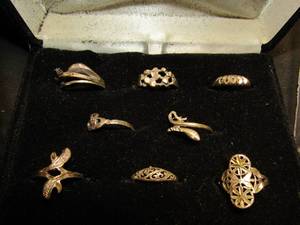 lot 372 image: set of .925 rings in decorated box all 8 rings in different designs all size 6