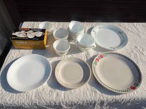 lot 212 image: Corning sugar & creamer NIB,  3 Pyrex brown coffee cups,  9 tea cups.  8 various mix & match corning plates & saucers
