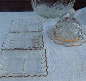 lot 183 image: Footed glass bowl with gold trim, 3 divided plates with gold trim and covered muffin plate
