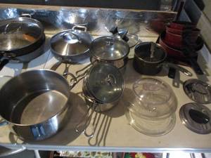 lot 49 image: 2-Totes-Over 60-Pieces Of Pots, Mixed lids, Baking and Cooking Pans And Sheets
