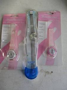 lot 87 image: 3-Ladies Watches, 1-Scrub Stuff Quartz, And 2-Share The Cure-Pink Ribbon Watch