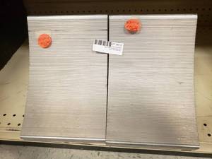 lot 412 image: EXTRUDED ALUMINUM WHEEL CHOCK, 11 58Wx8Hx7L, WEIGHS 6.25#S, NON-SPARKING, SURFACE GRIPPING TEETH ON UNDERSIDE (2 Total)