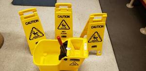 lot 246 image: COMPACT MOP BUCKET AND WRINGER COMBO, 28 GAL CAPACITY, FOR 16 OZ MOP AND CAUTION WET FLOOR SIGNS ( 3 TOTAL)