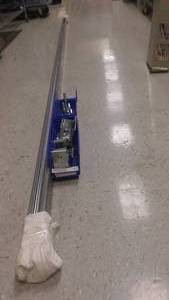 lot 90 image: SLIDING DOOR TRACK WITH MOUNTS AND WHEELS