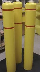 lot 97 image: 7X52 BOLLARDGARD YELLOW W RED TAPE (7.125ID) 3 TOTAL