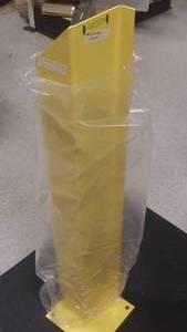 lot 104 image: DOOR TRACK PROTECTOR, 316 STEEL COLUMN, 916OUNTING HOLES, BASE 12 THICK STEEL, 58 MOUNTING HOLES, COLOR SAFETY YELLOW, 1 TOTAL