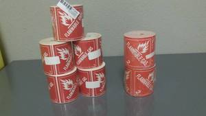 lot 180 image: Multiple rolls of Flammable Gas shipping stickers