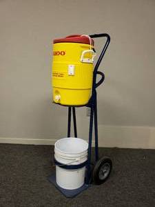 lot 142 image: COOLER DOLLY W5 GAL IGLOO COOLER