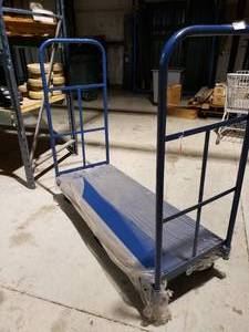 lot 321 image: 6 Wheel Blue Pkg Cart 63w x 24d x 59h 48 Removable Side Rails