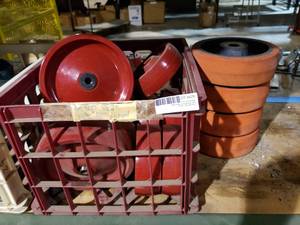 lot 676 image: Crate of Red Wheels, Solid Plastic No Hubs 8 and 6 x 2, Rubber Wheel Caster Hubs with Bearings (4 Total)