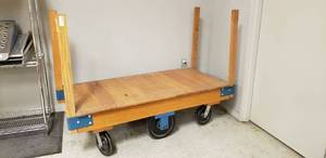 lot 563 image: HEAVY DUTY, SOLID WOOD DECK, FACTORY TILT TRUCK, 30x60 WITH REMOVABLE STAKES