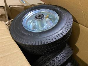 lot 374 image: Case of Mighty Lift Wheels Airless Tire 2.50 x 4 ( 10 Total)