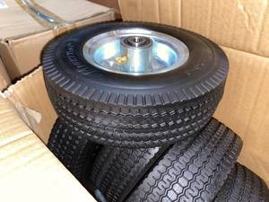 lot 377 image: Case of Mighty Lift Wheels Airless Tire 2.50 x 4 ( 10 Total)