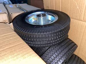 lot 378 image: Case of Mighty Lift Wheels Airless Tire 2.50 x 4 ( 9 Total)