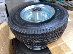 lot 379 image: Case of Mighty Lift Wheels Airless Tire 2.50 x 4 ( 10 Total)