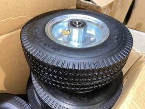 lot 380 image: Case of Mighty Lift Wheels Airless Tire 2.50 x 4 ( 10 Total)