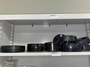 lot 428 image: Assorted Pallet Jack Wheels, Black Color