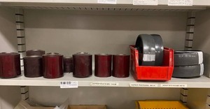 lot 430 image: Assorted Pallet Jack Wheel Lot, Red and Grey