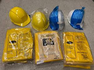 lot 446 image: Rain coats 6 sm 3 lg and Hard hats 2 yellow2white