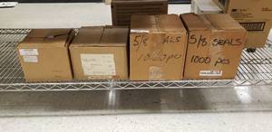 lot 863 image: 58 STEEL OPEN SEAL (2 Boxes), 58 SERRATSEALS-POLY( 1 Box), and 601 SEALS 34 OPEN 1000BOX ( 1 Box)