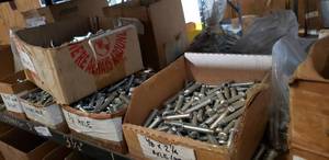 lot 840 image: Shelf lot of caster brake parts