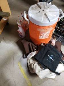 lot 873 image: Misc lot of cooler,  aprons, cleaning supplies