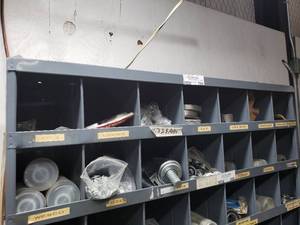 lot 800 image: metal parts cabinet top 2 rows of parts only lots of bearings