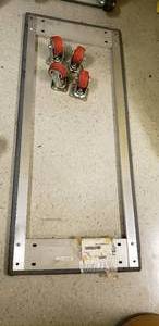 lot 128 image: DOLLY BASE 24x60 w 4 SWIVEL CASTERS 6 (Needs Assembled)