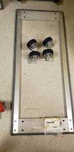 lot 129 image: DOLLY BASE 24x60 w 4 SWIVEL CASTERS 7 (Needs Assembled)
