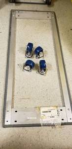 lot 131 image: DOLLY BASE 24x60 w 4 SWIVEL CASTERS 6 (Needs Assembled)