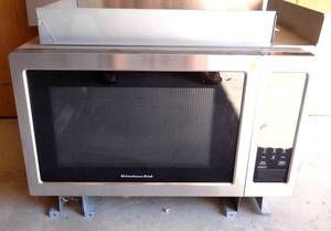 lot 2 image: NEW - KitchenAid Microwave Oven with Convection. In wall unit with Stainless Cover