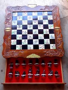 lot 36 image: BEAUTIFUL CHINESE CARVED CHESS SET WITH STORAGE DRAWERS - LIKE NEW