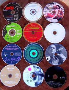 lot 151 image: ASSORTED LOT OF 12 MUSIC CDS