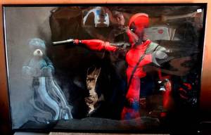 lot 171 image: LARGE 24 X 36 DEADPOOL POSTER IN FRAME