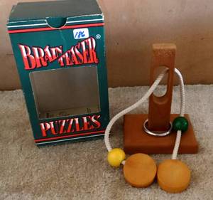 lot 186 image: FUN LEFT BRAIN WOODEN PUZZLE IN ORIGINAL BOX W INSTRUCTIONS