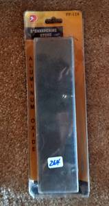lot 264 image: ALUMINUM OXIDE 8 SHARPENING STONE