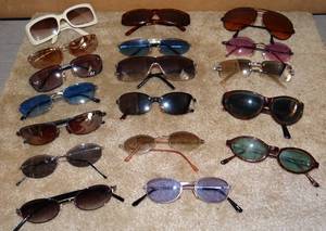 lot 120 image: LARGE COLLECTION OF SUNGLASSES IN PLASTIC TOTE