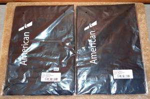 lot 282 image: NEW IN BAG - TWO AMERICAN AIRLINES FLIGHT ATTENDANT SERVING GARMENTS (APRONS)