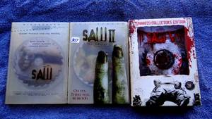 lot 307 image: SAW MOVIE - DVD COLLECTORS EDITIONS  #1, 2 & 4