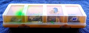 lot 309 image: 4 BIN STORAGE TRAY WITH ASSORTED NUTS AND BOLTS